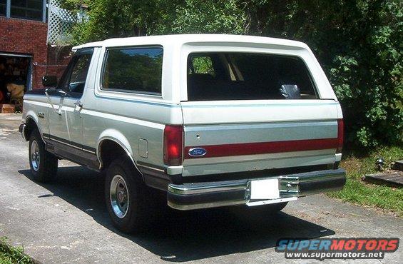 Rear view of a white Ford Bronco parked on a driveway