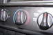 1997 Ford Probe - Close-up of the climate control knobs and settings inside a vehicle.