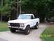 1979 Ford Bronco - White 1979 Ford Bronco with aftermarket wheels and tires.