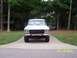 1979 Ford Bronco - This white Ford truck is parked in a driveway with trees and a house in the background. The date 06/19/2005 is visible.