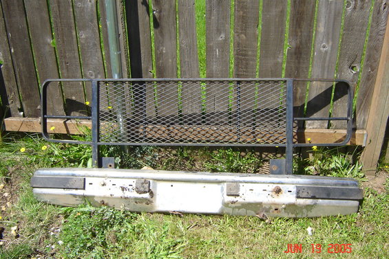 Front bumper with brush guard