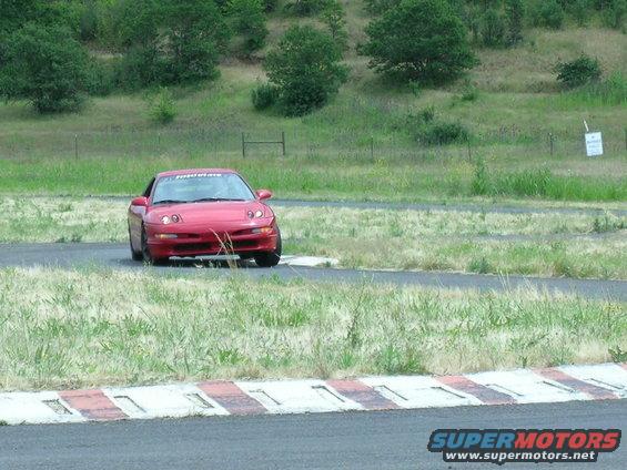 1993 Ford Probe on a race track, front view