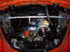 1964 Volkswagen Beetle - Close-up view of the engine bay, dual carburetors, air filters, and a prominent alternator.