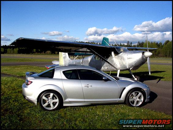 rx8silverplane.jpg ...if my RX8 had a cousin which could fly...