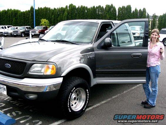 My wife holding the keys to 'her truck' just prior to leaving the dealership, 11 Jun 05