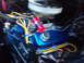 1974 Ford F-250 - Close-up view of an engine bay, showing various components and wiring.