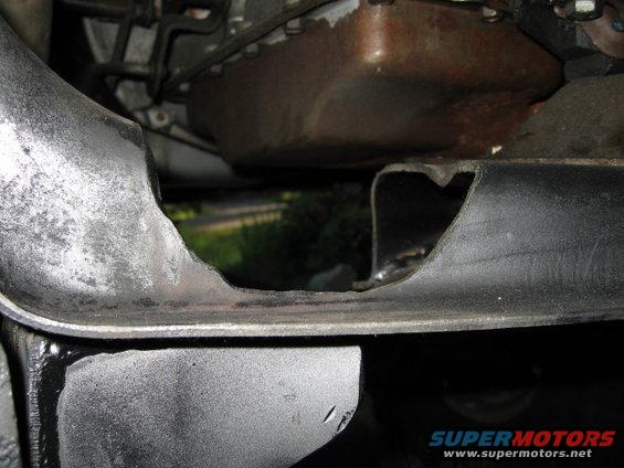 Here is a picture from the rear of the stock Xmember, see how much material is cut out?