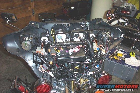 motorcycle fairing with exposed wiring and speakers