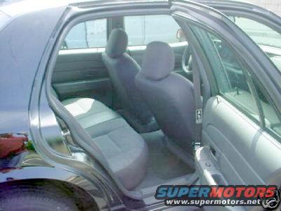 Interior view of 2003 Ford Crown Victoria showing front and rear seats