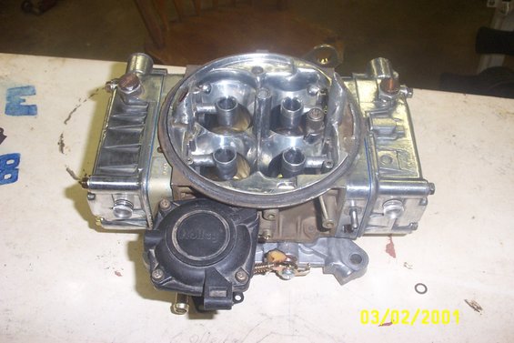 Holley carburetor with four barrels and chrome accents