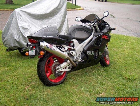 Black 2002 Suzuki TL1000R motorcycle with red wheels