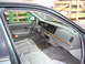 1996 Ford Crown Victoria - Interior view of a 1996 Ford Crown Victoria, showing the dashboard, steering wheel, and front seats.