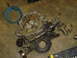 1986 Ford Mustang - Engine timing cover and fuel pump assembly, likely removed for repair or replacement.