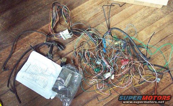 Wiring harness and diagram on wooden surface