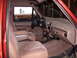 1994 Ford Bronco - Interior view of a 1994 Ford Bronco, tan upholstery and dashboard details.