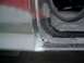 1981 Ford Bronco - Undercoating applied to the door sill area of a vehicle.