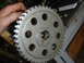 1986 Ford Mustang - Camshaft gear with visible teeth and mounting holes.