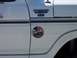 1995 Ford Bronco - A white 1995 Ford Bronco Ranger XLT is shown from the side, an American flag sticker with a Bronco graphic.