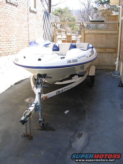 White and blue Sea-Doo Sportster LE jet boat on a trailer, with registration number 59E 2808 visible