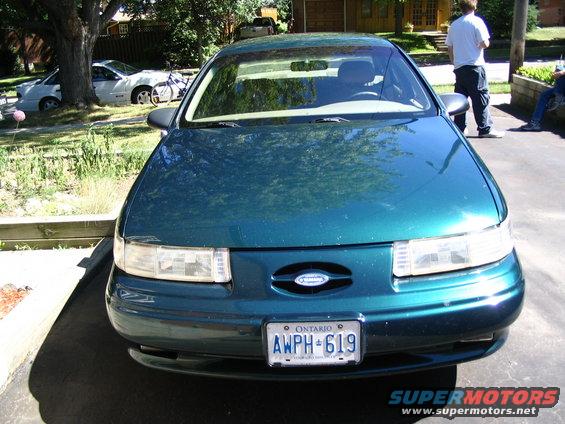 img_0800.jpg Thomas' new car, and mine in the background