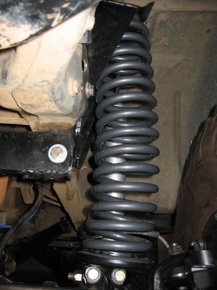 107_0724_2.jpg with weight on the coils, I had from what others had experieced, the same superflex bow problem.