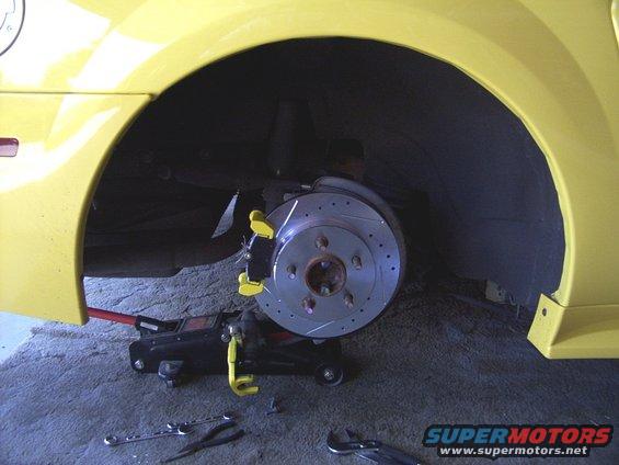 dcp_3897.jpg Caliper bracket and new Ceramic pads installed