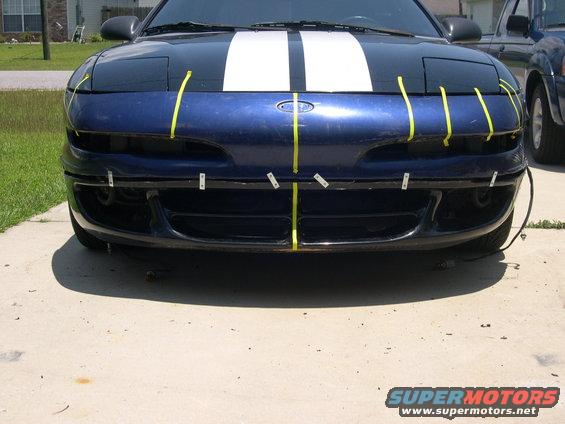 1997 Ford Probe front bumper with yellow tape markings