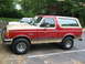 1990 Ford Bronco - Two-tone 1990 Ford Bronco parked outdoors with another vehicle nearby.