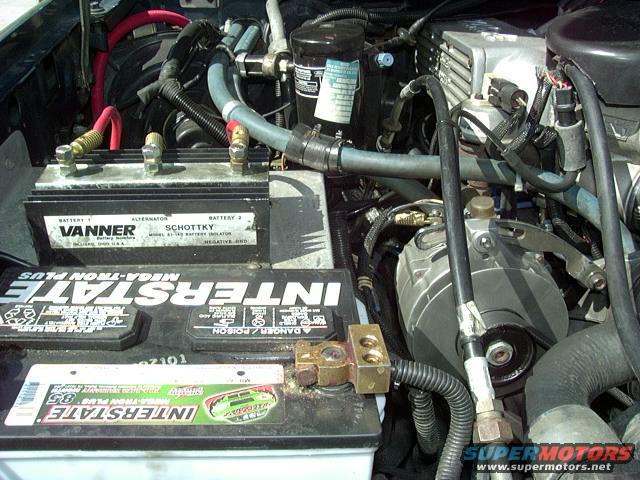 Engine bay showing Interstate Mega-Tron Plus batteries and a Vanner/Schottky battery isolator