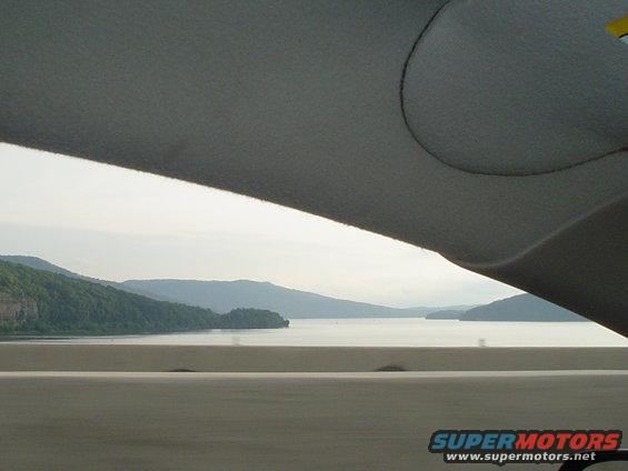 Interior car view of lake and mountains