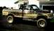 1979 Ford F-250 - This 1979 Ford F-250 pickup truck is covered in mud, indicating recent off-road use.