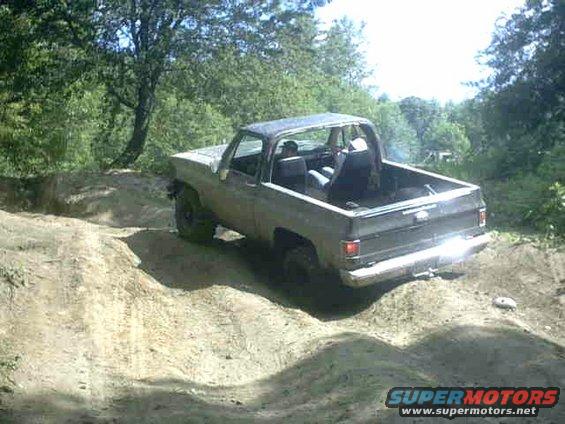 jul04356.jpg Junior trying to climb the hill