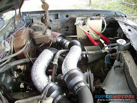 This is a hose that allowed RV's to drain there waist at dump sites...it made a great intake rapped in stainless tape...the 2 K&N's will be in the hood under a large cowel type scoop!!!!!