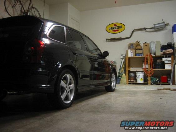 garage-wall.jpg that's my bro's car.  mods: blue LED under car kit, custom bent stainless steel header, cat back racing beat exhaust, sparco touring seats, JDM sparkplugs, deleted air intake before air box, K&N drop in filter, and a B&M short throw shifter. it looses 100 lbs on the days we take it to race