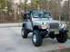 1995 Dodge 1500 - This Jeep Wrangler Rubicon is equipped with a snorkel and large off-road tires.