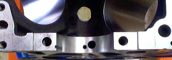 The oil passage is offset.