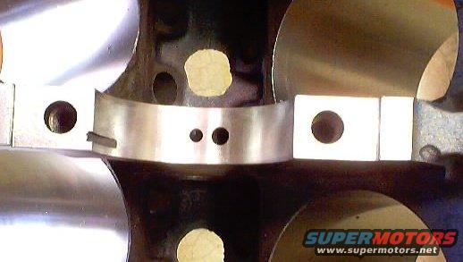 Here the oil passage is centered in the main saddle, and centered in the main bearing groove.