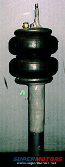 Custom made Air strut, shortened 3" yea, I shortened the strut 3", welded a bag on the charged it back up...