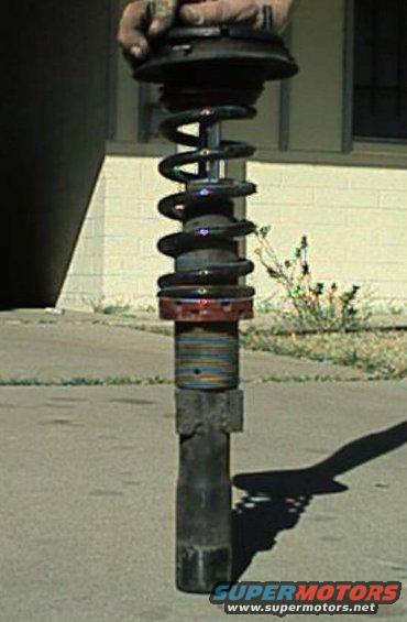 Custom made front coil over, cut off the old spring perches, and welded on new spring perches, this is aso another easy mod that anyone can do with a welder, and a grinder... 