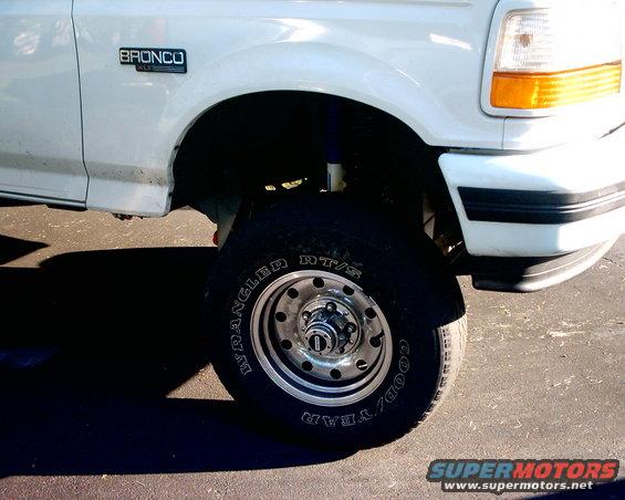 1996 Ford Bronco fender and wheel with 'Bronco' badge visible