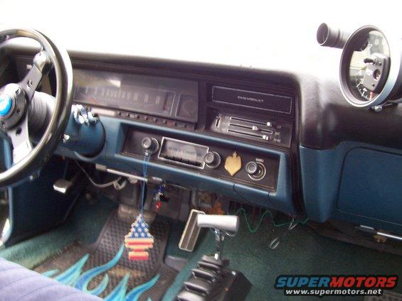 1971 Chevrolet Chevelle interior dashboard with aftermarket gauges and a Hurst shifter