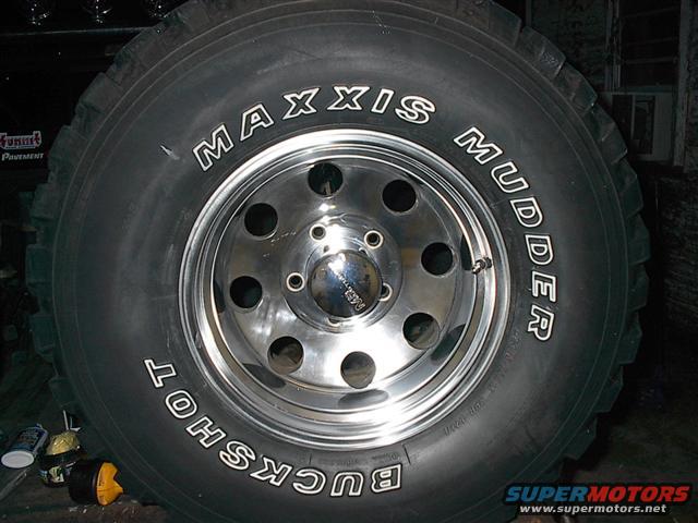 Maxxis Mudder Buckshot tire on a chrome wheel
