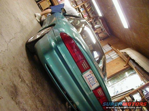 1994 Ford Probe rear view in a garage, North Carolina license plate FAZDA