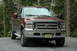 2006 Ford F-350 - This 2006 Ford F-350 Super Duty pickup truck is shown from the front, its distinctive chrome grille and a New Jersey license plate.