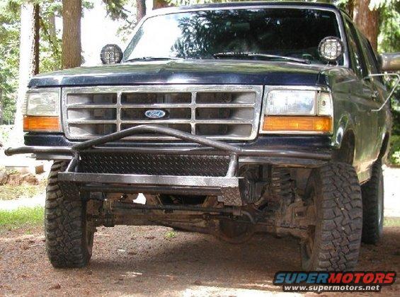 as she stands today, tube front bumper, body lift and a diamondplate back bumper