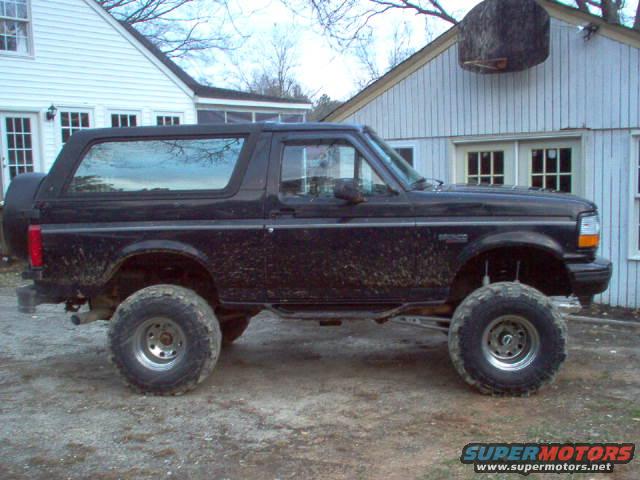 A LITTLE DIRTY BUT IT IS GETTING BIGGER THIS IS THE 3 BODY AND A 6 INCH STAGE 2 KIT FROM SKYJACKER WITH THE EXTENDED RADIUS ARMS, AND 35X15.50 SUPER SWAMPERS ON SOME 12 INCH WIDE UGLY STEEL WHEELS(THEY COME WITH THE TIRES IT WAS A GOOD DEAL BUT I HATE STEEL WHEELS) SHE'S GETTING BIG BUT A FEW MORE INCHES WILL DO!
