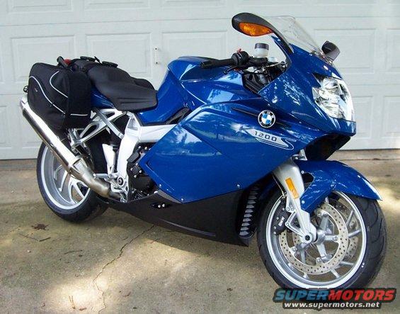 Blue BMW motorcycle with saddlebags, 3q-front view