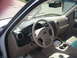 2003 Ford Expedition - The interior of a 2003 Ford Expedition is visible, including the dashboard and steering wheel.