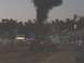 1994 Ford F-150 - A red pickup truck is seen pulling a trailer while emitting a large plume of black smoke, possibly during a competition.