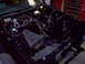 1970 Ford Ranchero - The engine bay is black and shows exposed wiring, suggesting it's in the process of being worked on.